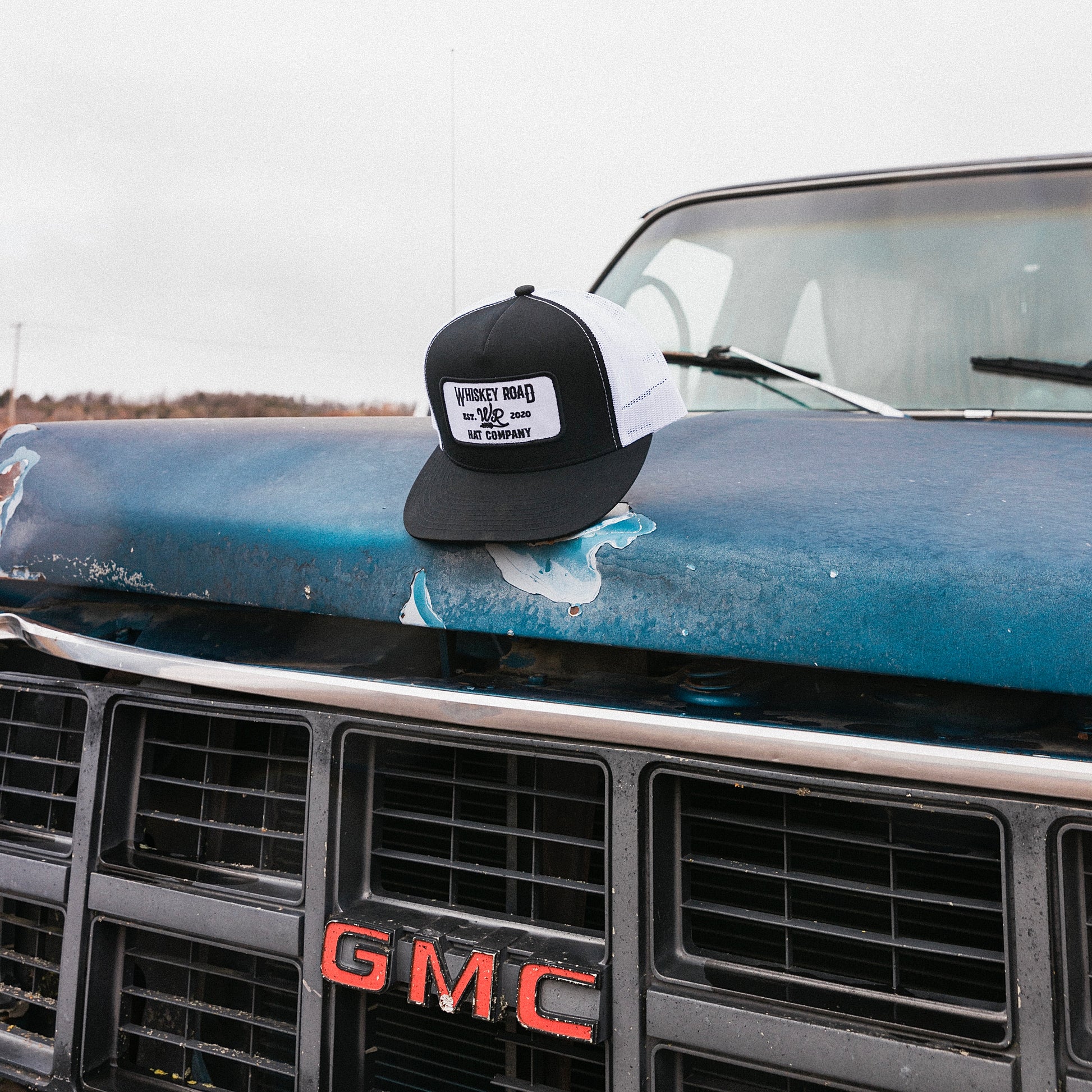 WR Outlaw - Black/White Trucker Hat - Whiskey Road Hat Company